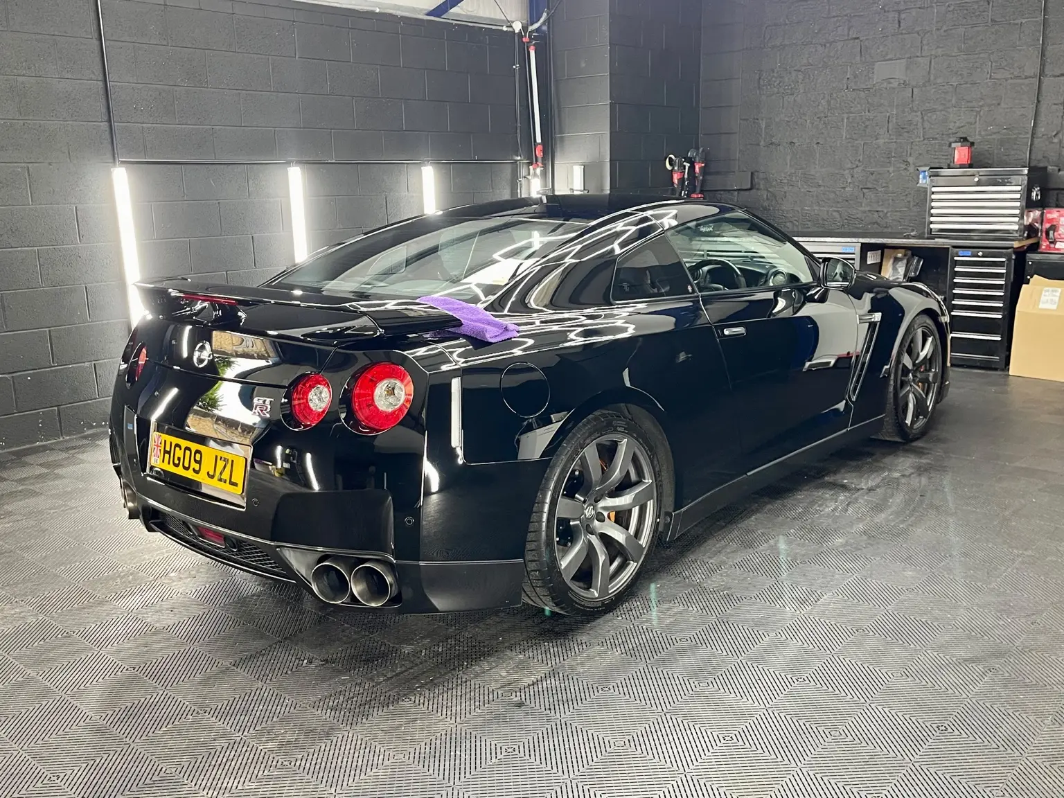 Black Nissan GT-R detailed in the NME workshop